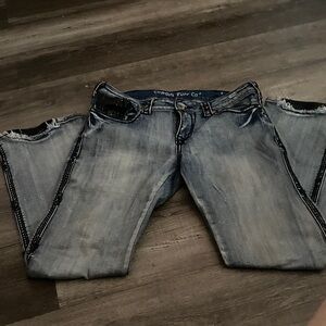 Cowgirl Tuff Distressed Blue Jeans